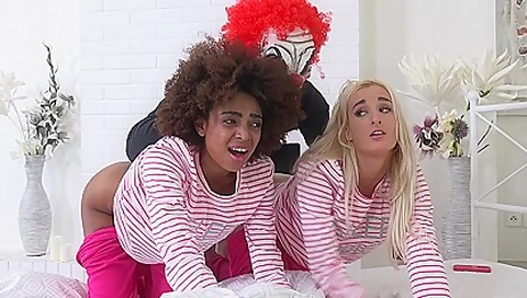 Evil clown attacks two girlfriends