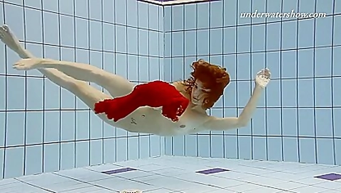 Ala underwater swims naked
